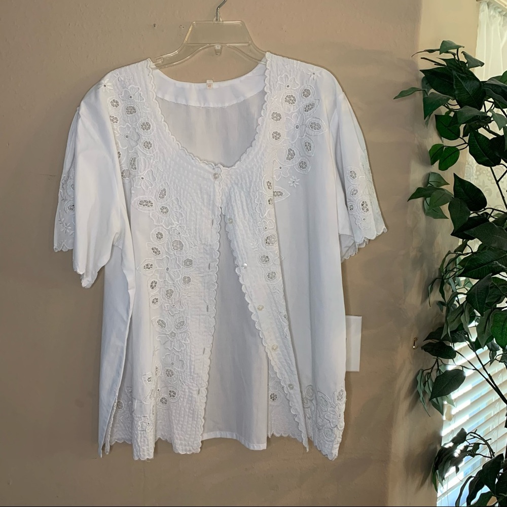White cotton blouse with cut-out lace pattern